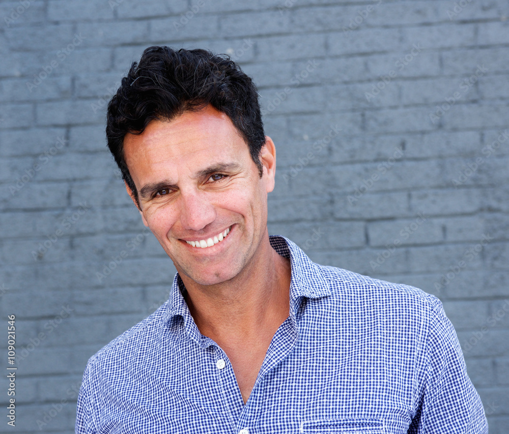 Close up portrait of a smiling attractive man Close up portrait of a smiling attractive man