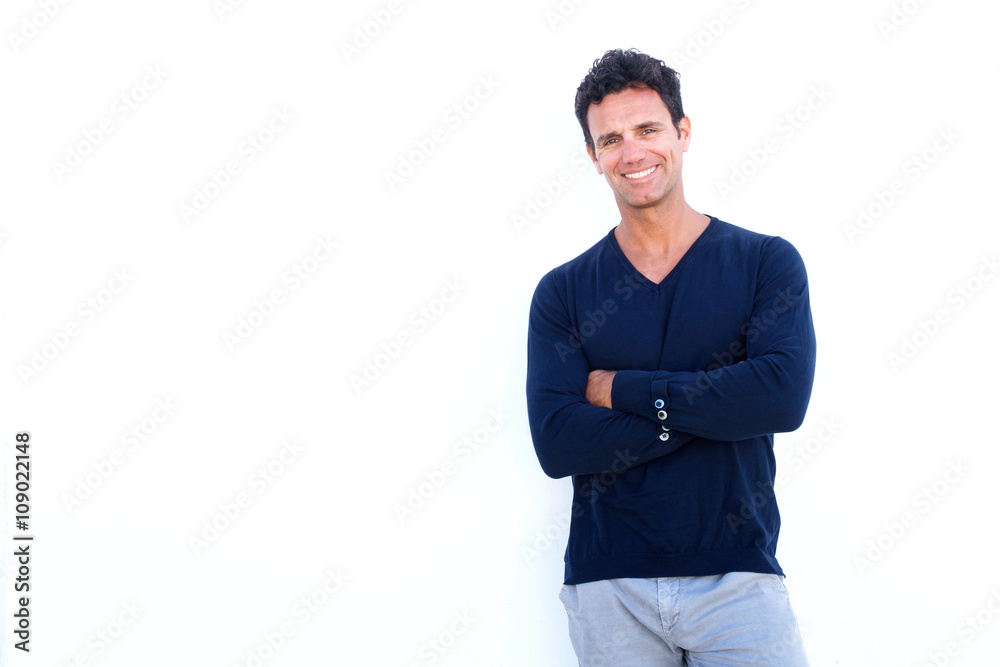 Handsome rugged man smiling against white background Handsome rugged man smiling against white background