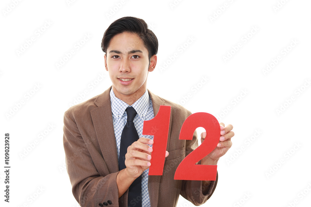 数字を持つビジネスマン