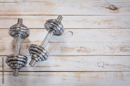 Two dumbbells on the floor