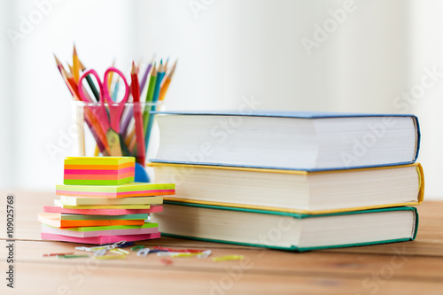 close up of pens, books, clips and stickers