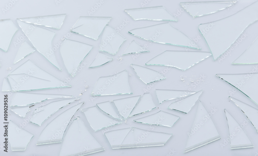 Broken glass, cracked glass on white Broken glass, cracked glass on white