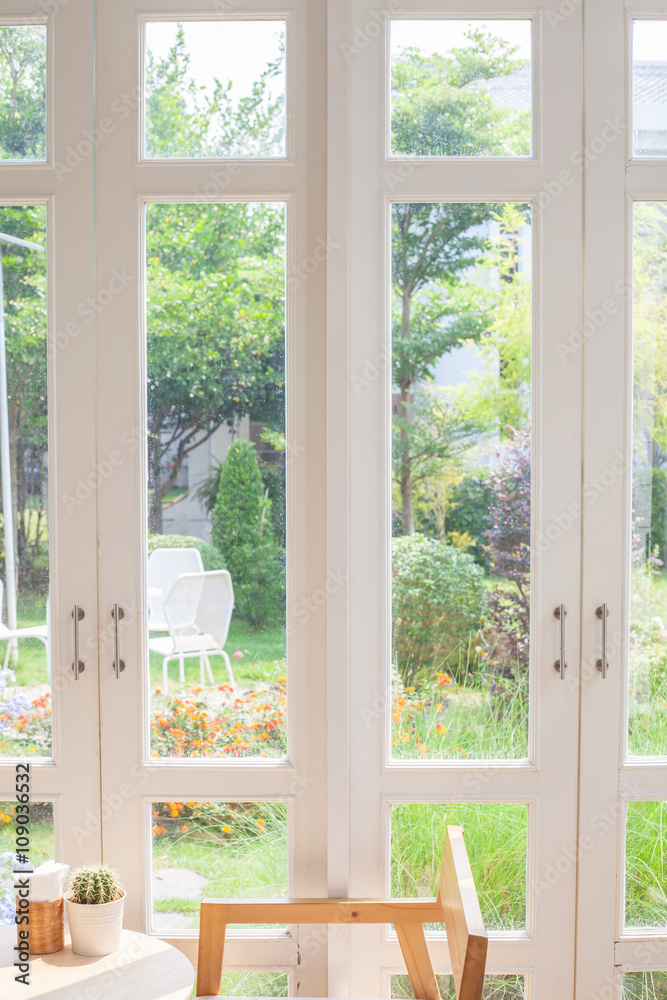 Fototapeta premium Window with a view of the garden