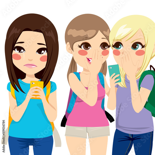 Teenager girl crying while reading harassment message on her smartphone with her classmates making cyber bullying