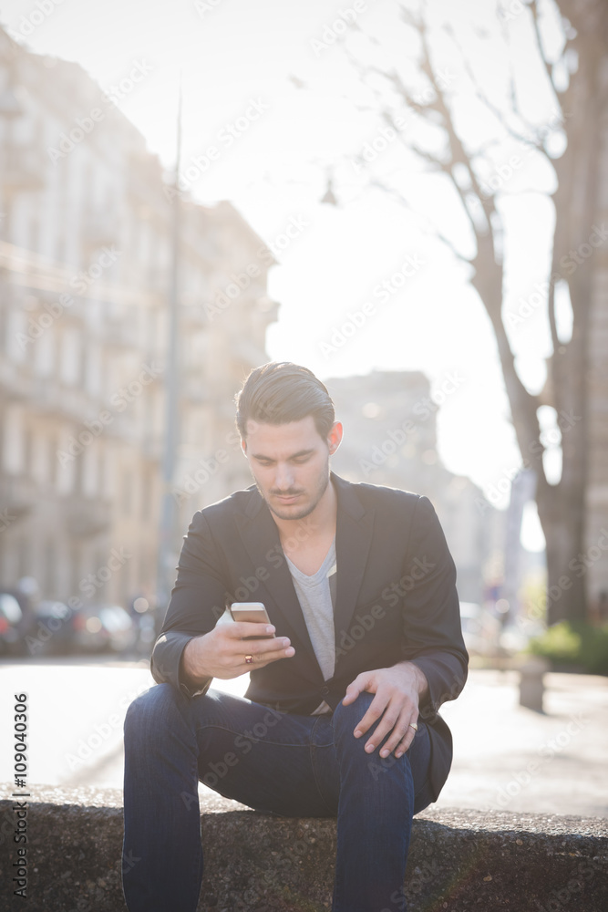 Young italian boy using smartphone Young italian boy using smartphone