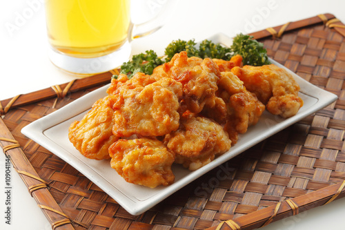 鶏の唐揚げとビール　Fried chicken and beer photo