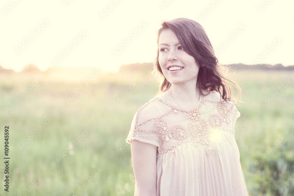 Beautiful girl dress with brown hair, hot summer day park, relaxing poses, fashion style concept idea of modern beauty, lifestyle, happy outdoors Beautiful girl dress with brown hair, hot summer day park, relaxing poses, fashion style concept idea of modern beauty, lifestyle, happy outdoors