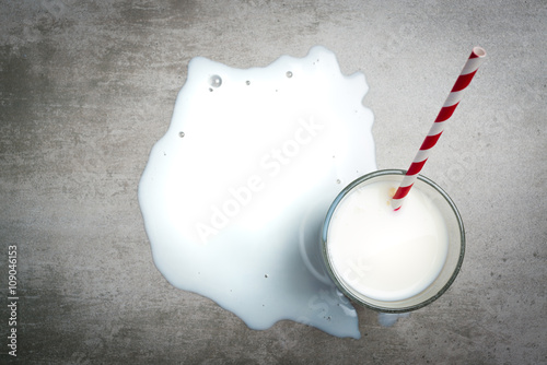 Glass of milk on a concrete table