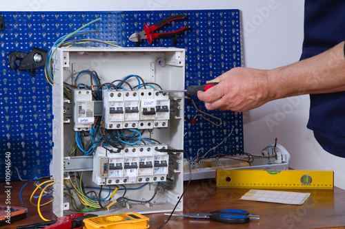 electrician at work with an appliance