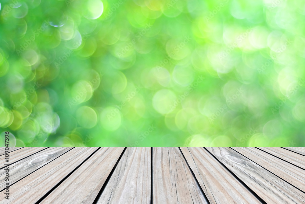 Perspective wood over blur park with bokeh background