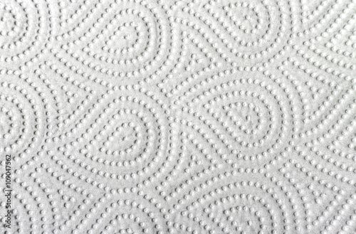 White paper towel.Close-up view of ornamented paper napkin  texture background.