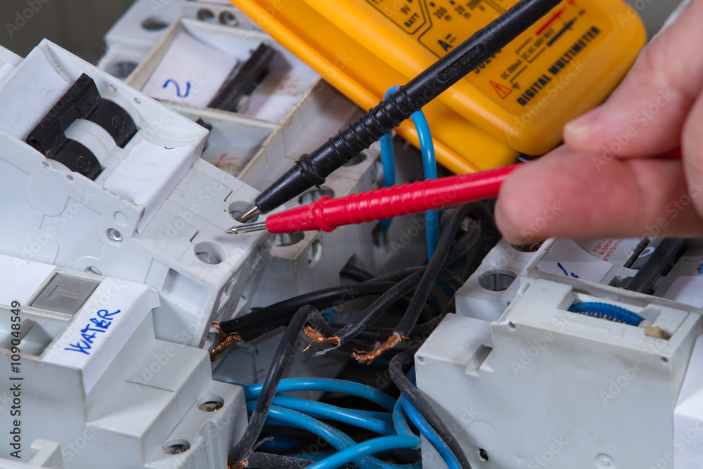 electrician at work with an appliance electrician at work with an appliance