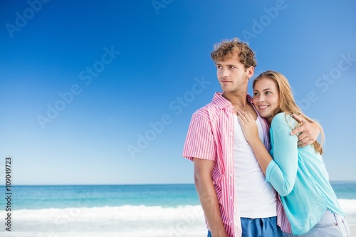 Happy couple hugging on the beach © WavebreakmediaMicro