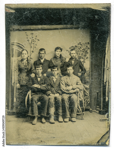 Tintype, circa 1880, USA, of group posed in studio
