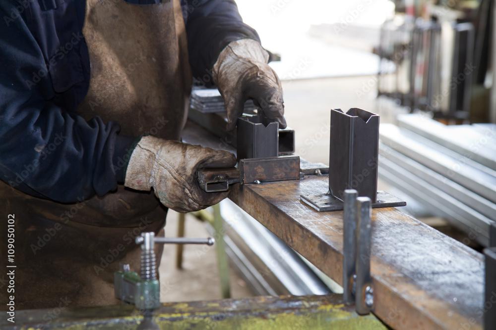 metalworker at work in his workshop metalworker at work in his workshop