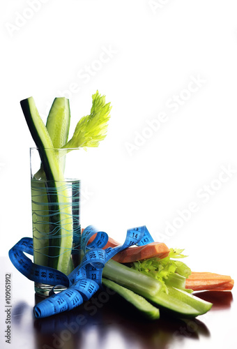 glass with vegetables diet mesaure photo