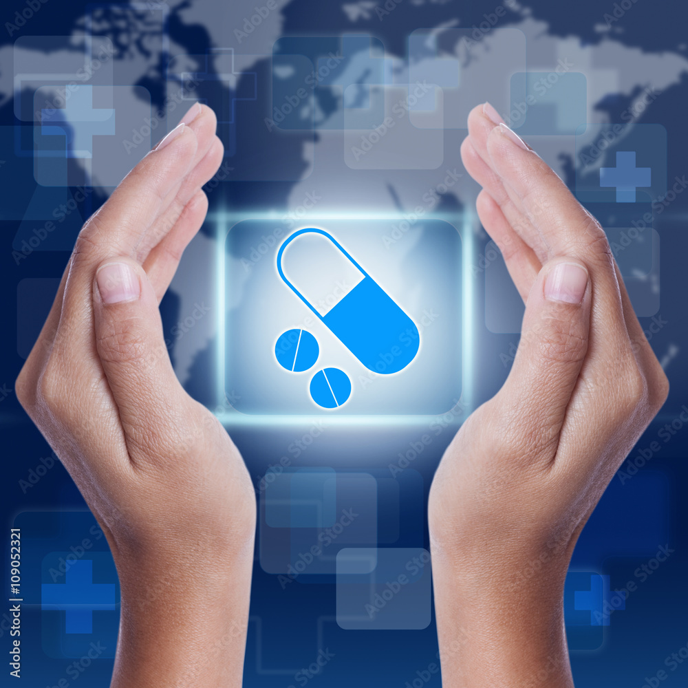 Hand showing pills symbol. medical concept Hand showing pills symbol. medical concept