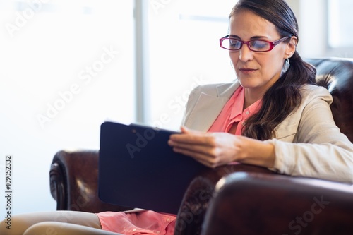 Concentrated psychologist woman