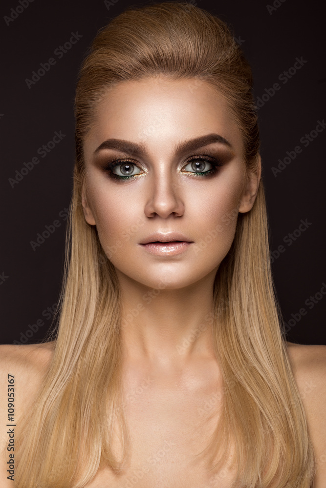 Beautiful woman with evening make-up, long straight hair . Smoky eyes. Fashion photo. Beautiful woman with evening make-up, long straight hair . Smoky eyes. Fashion photo.