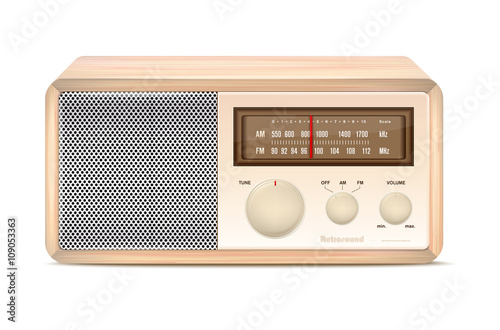 Wooden vintage radio on white background