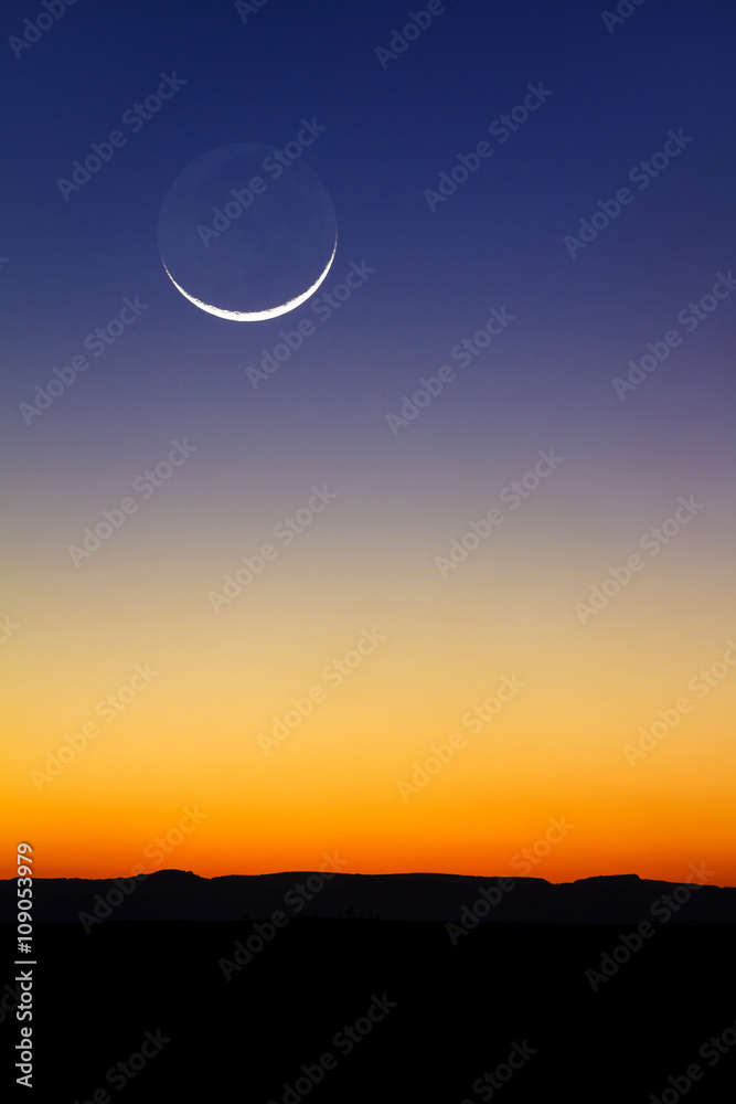 Fototapeta premium Beautiful new moon at sunset in Madagascar