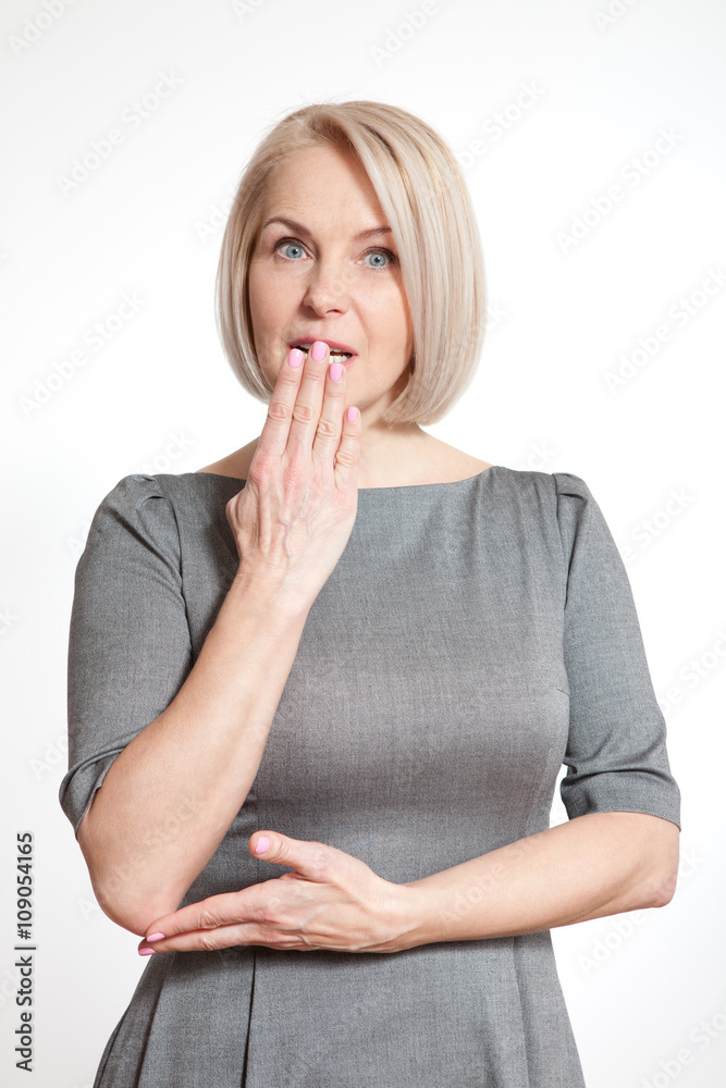 Portrait woman with finger on lips, or secret gesture hand sign isolated on white background Portrait woman with finger on lips, or secret gesture hand sign isolated on white background