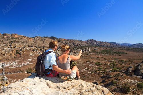 Tourists looking out over the beautiful landscape of Isalo national park in Madagascar