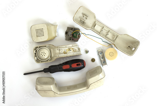 Broken Old Telephone Handset , top view, on White Background.