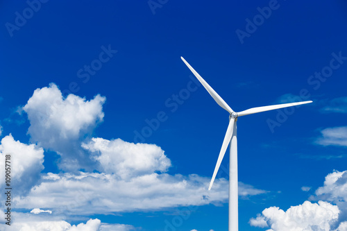 Wind turbine front view on blue sky