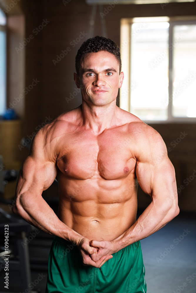 Strong Athletic Man Fitness Model Torso showing six pack abs Strong Athletic Man Fitness Model Torso showing six pack abs