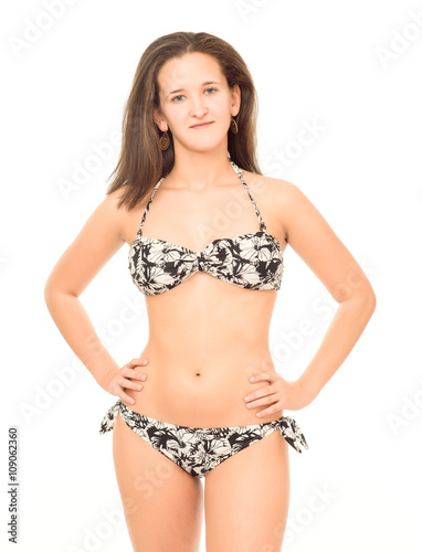 young woman in bikini poses