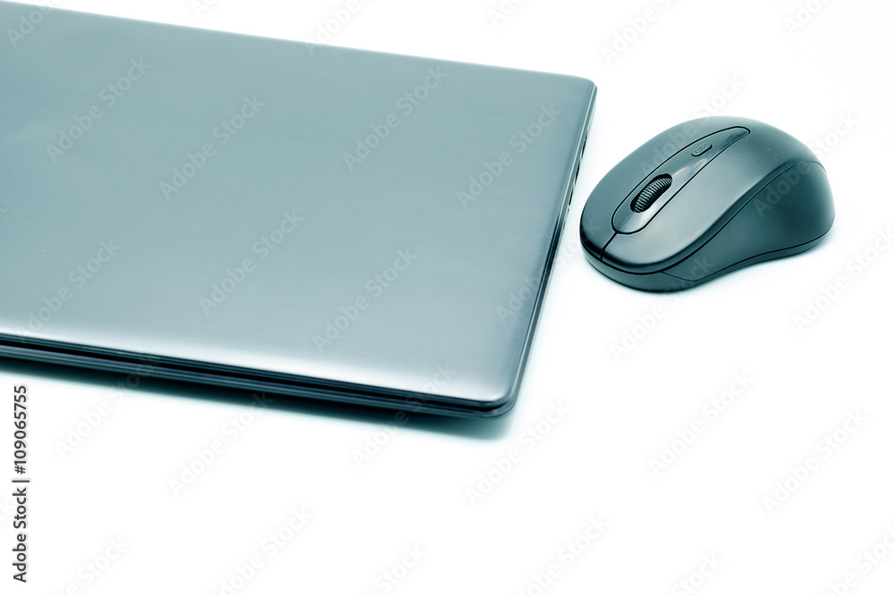 Laptop and mouse. Laptop and mouse.
