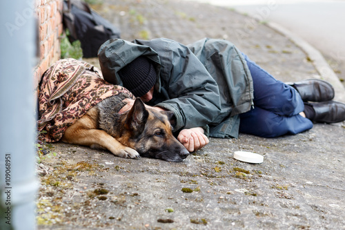 male homeless and his dog
