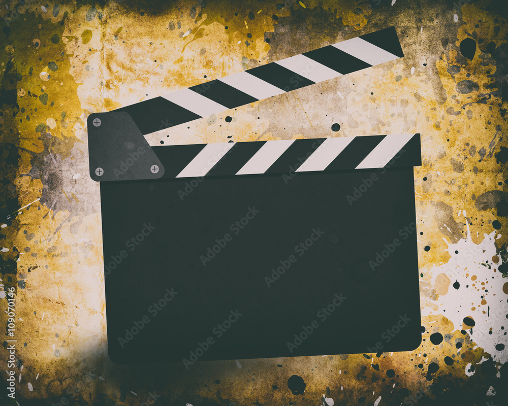 Fotografie Movie clapperboard on a grunge
