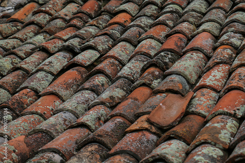 Worn-out clay roofing in close-up