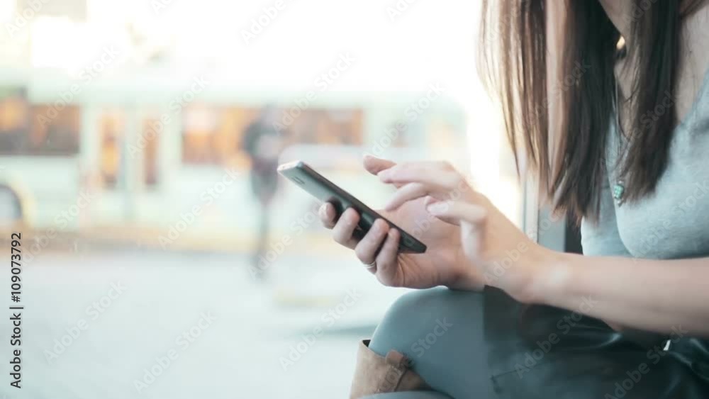 Woman hands texting, using smartphone in cafe. Woman hands texting, using smartphone in cafe.
