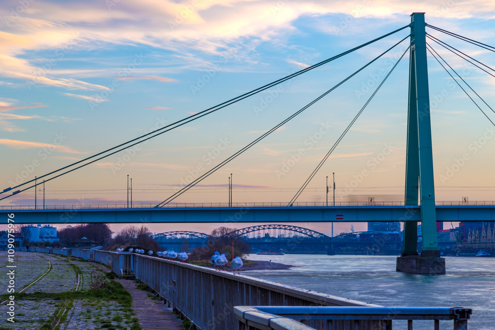 Closeup of Severins Bridge in Cologne, Germany at dusk