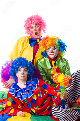 Fotografie Three colorful funny clown on a white background