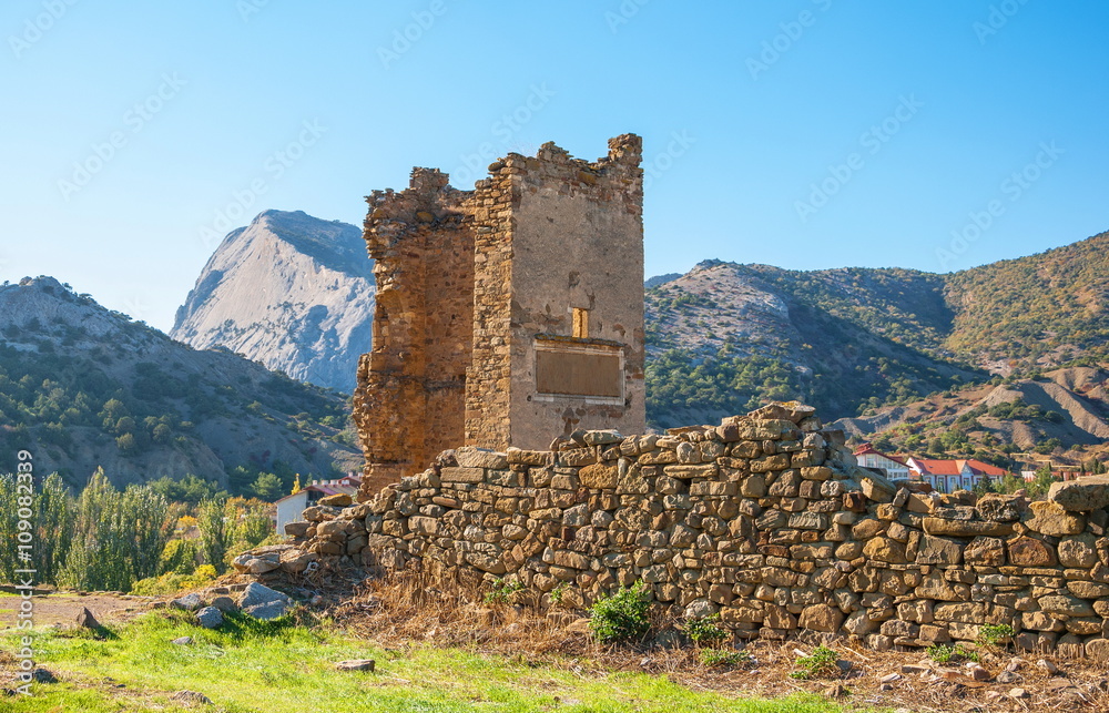 The ruins of the Genoese fortress on a background of mountains in Sudak