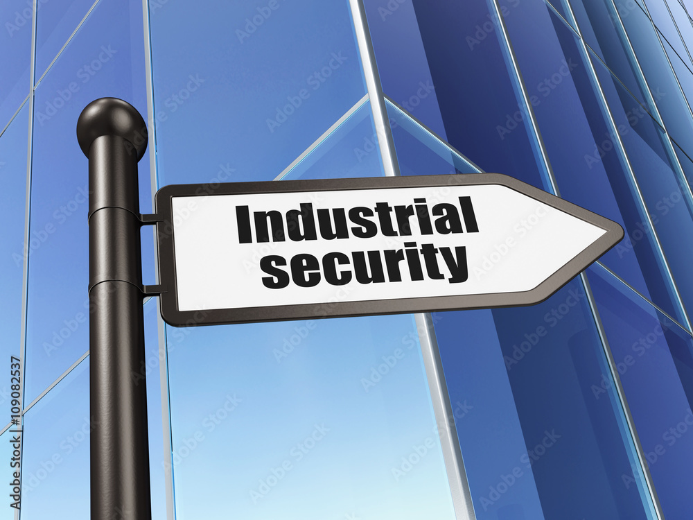 Fototapeta premium Safety concept: sign Industrial Security on Building background
