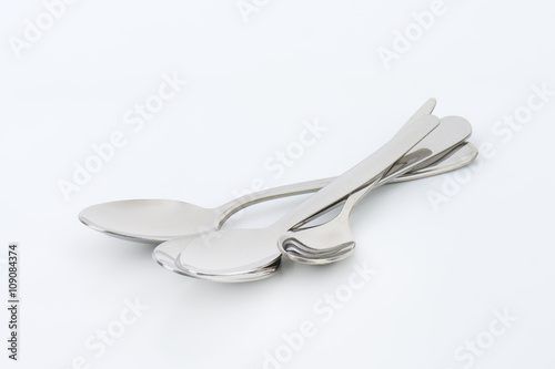 four metal spoons