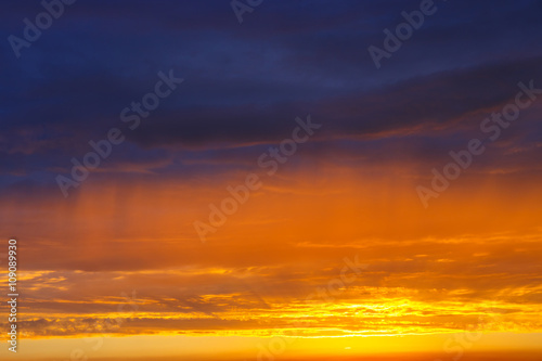 orange, blue and yellow colors sunset sky © dziewul