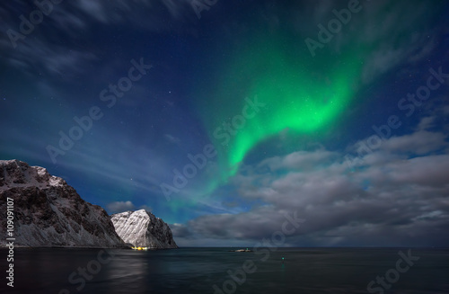 Aurora above sea and mountains, Lofoten © swen_stroop