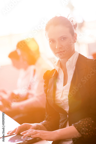business woman at office people group on meeting in background