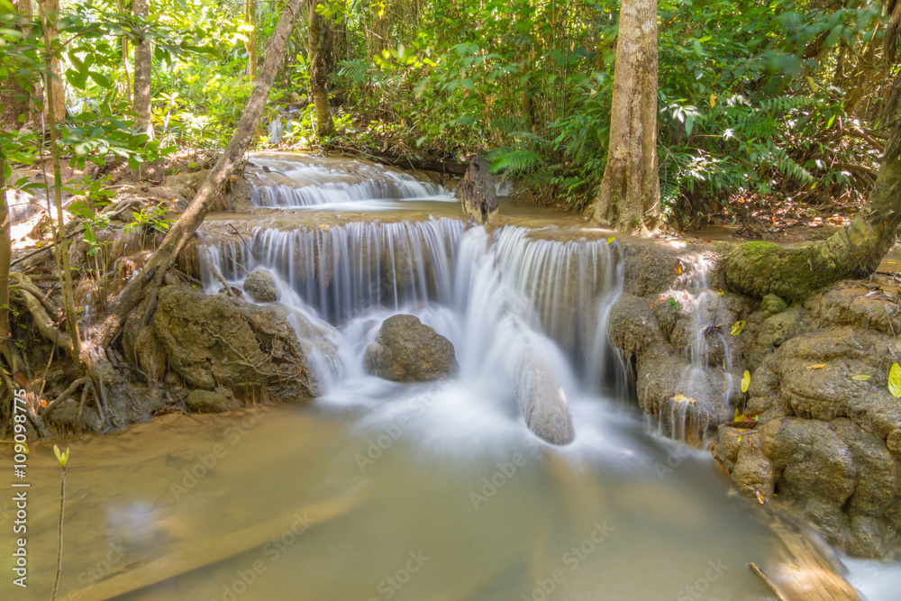 Obraz premium Waterfall in deep forest / waterfall with long exposure technic