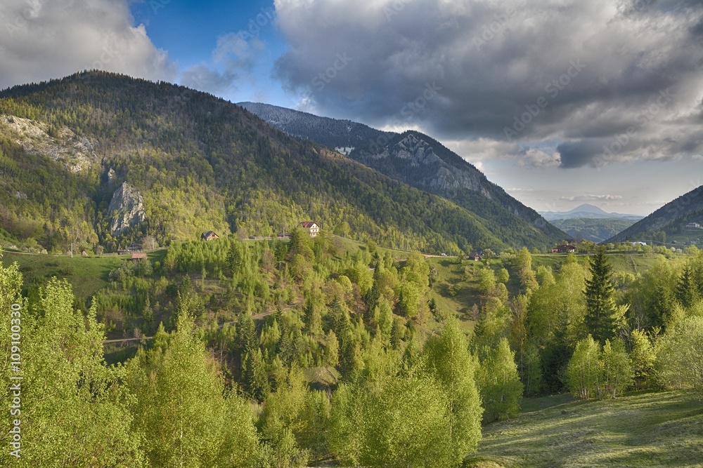 Obraz premium Carpathian Mountains, Romania. Rural landscape with Magura village in Piatra Craiului National Park
