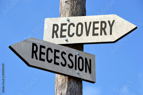 Recovery and recession signpost photo