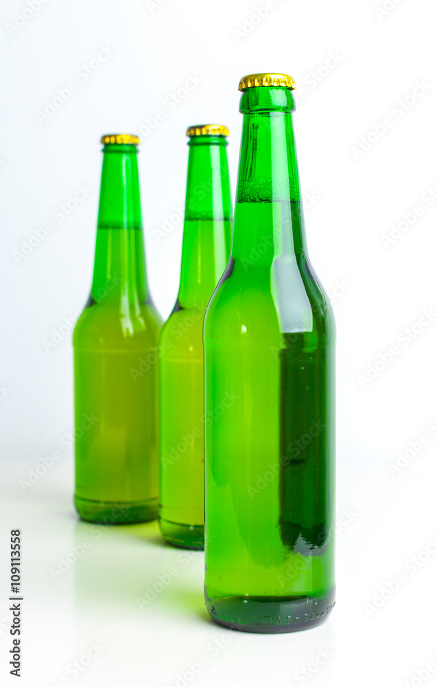 Row of beer bottles Row of beer bottles