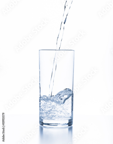 water splashing from glass isolated on white background