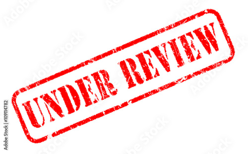 UNDER REVIEW rubber stamp text on white background